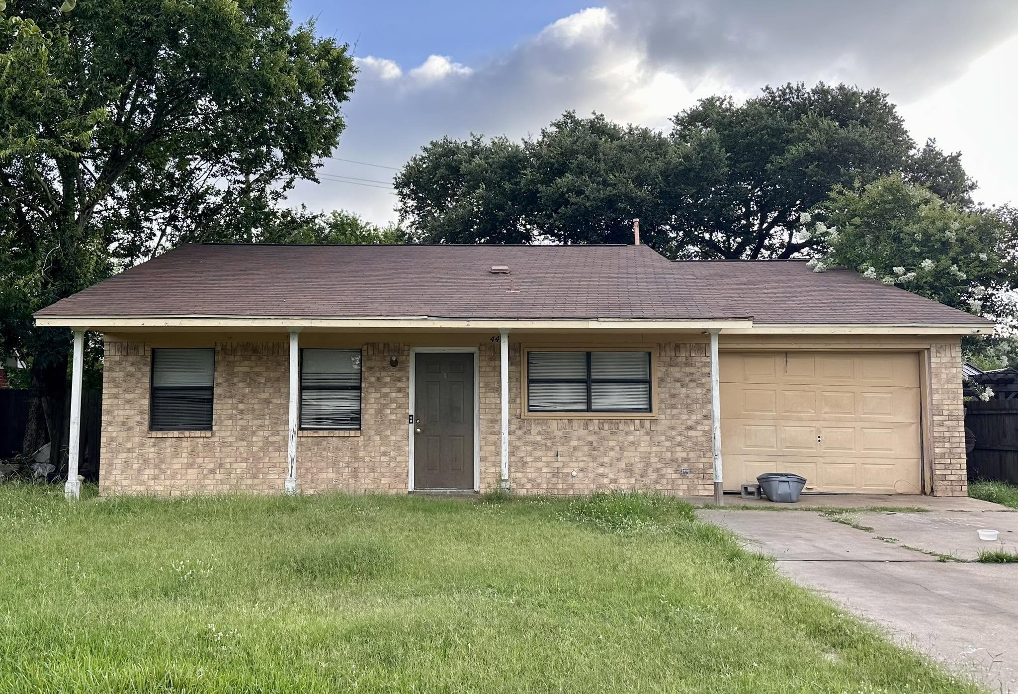 Before — small ranch house yard without pool
